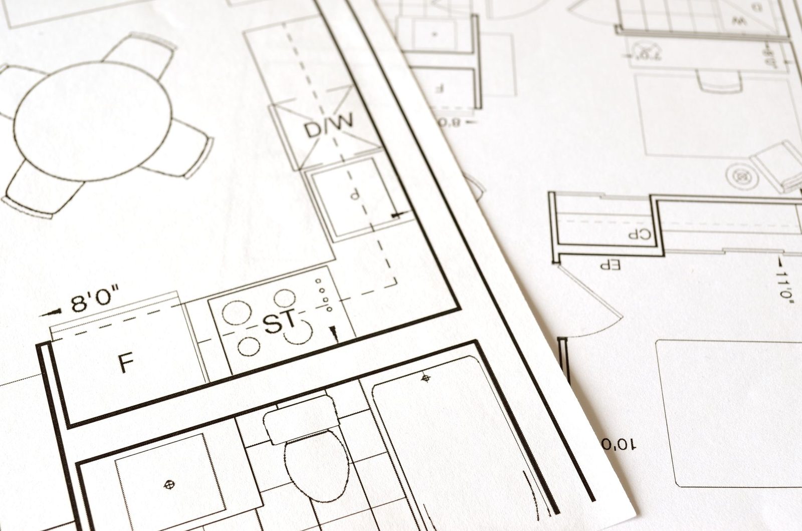 Hand-drawn kitchen floor plans with appliance positions marked